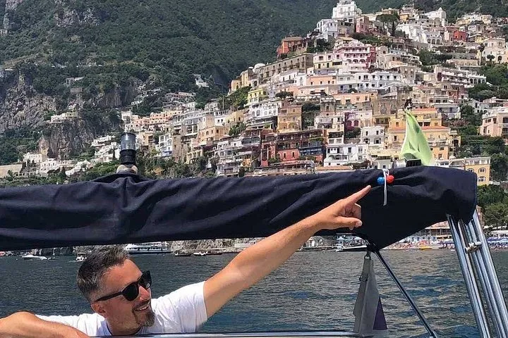A leisure boat with a local captain off the Amalfi Coast on a private boat tour of the Amalfi Coast, Italy